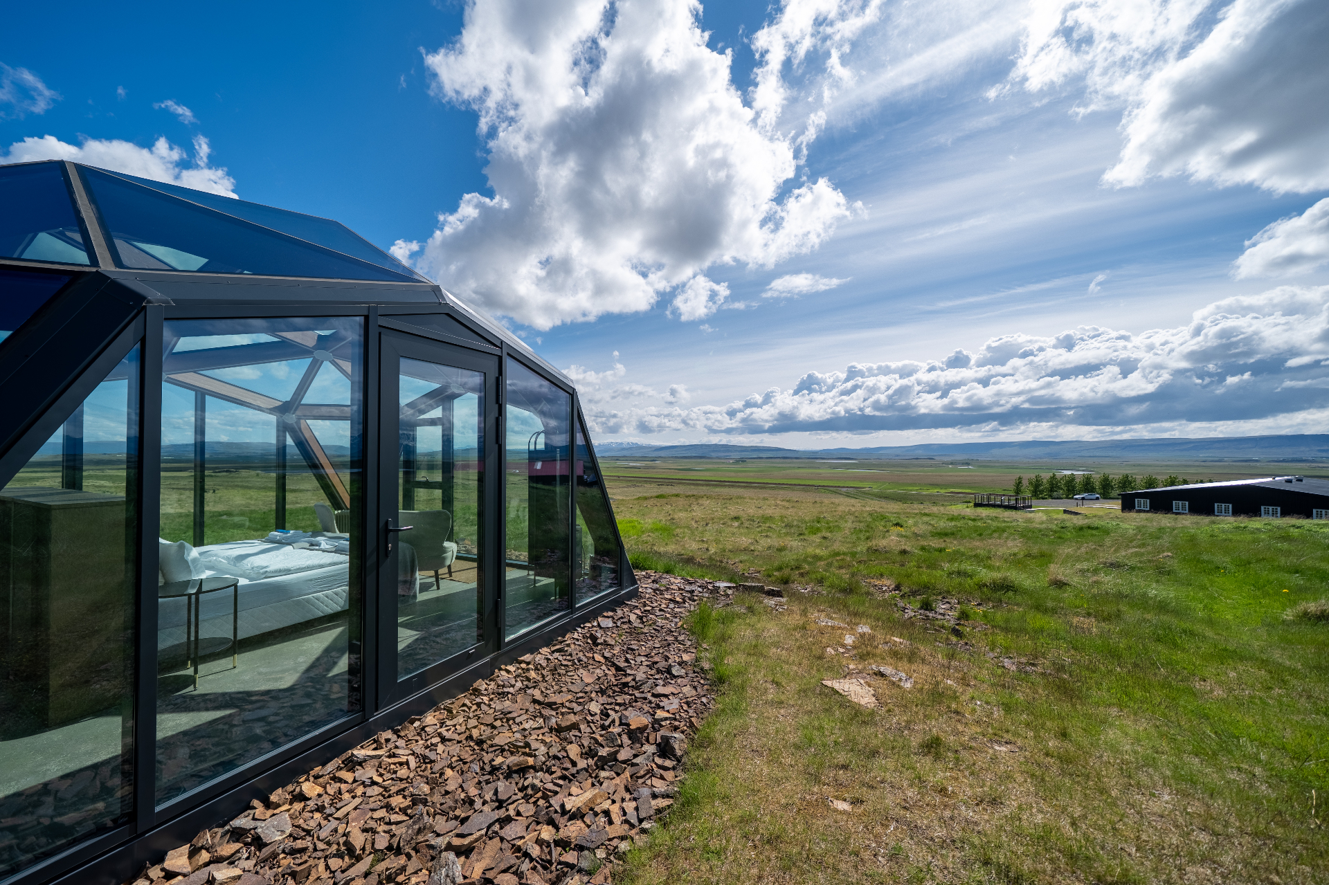 Exterior of the Aurora Cabin with sweeping countryside views