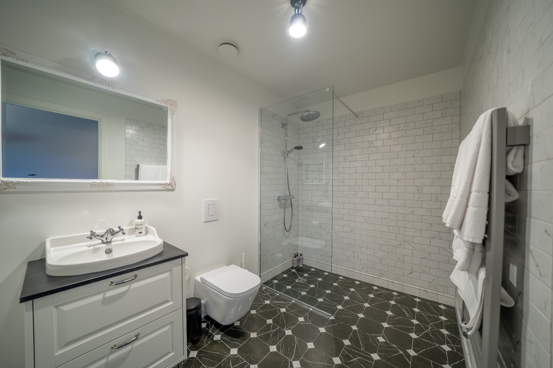 Private bathroom with walk-in shower in the family room