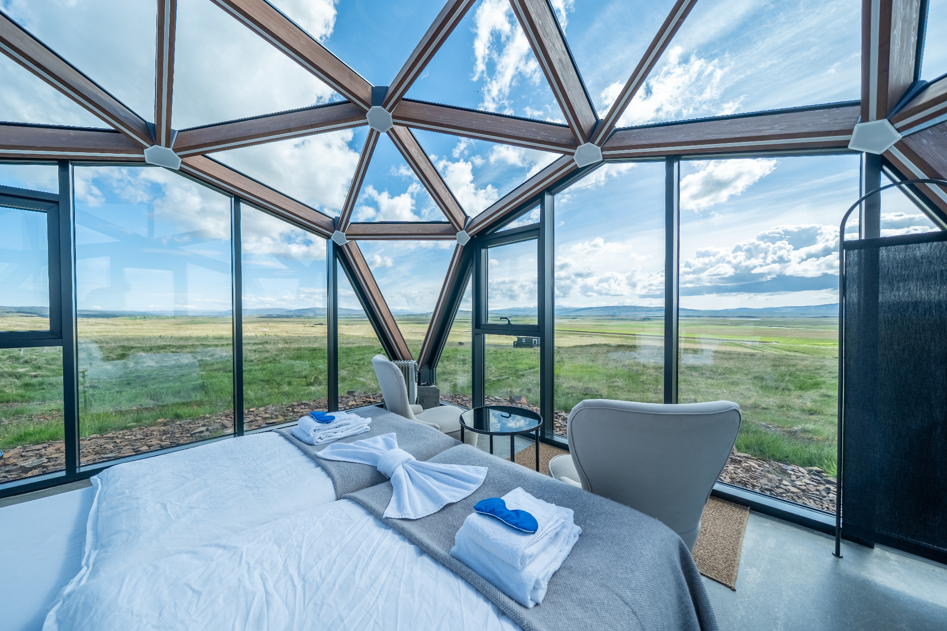 Aurora Cabin bed under the glass dome with panoramic views